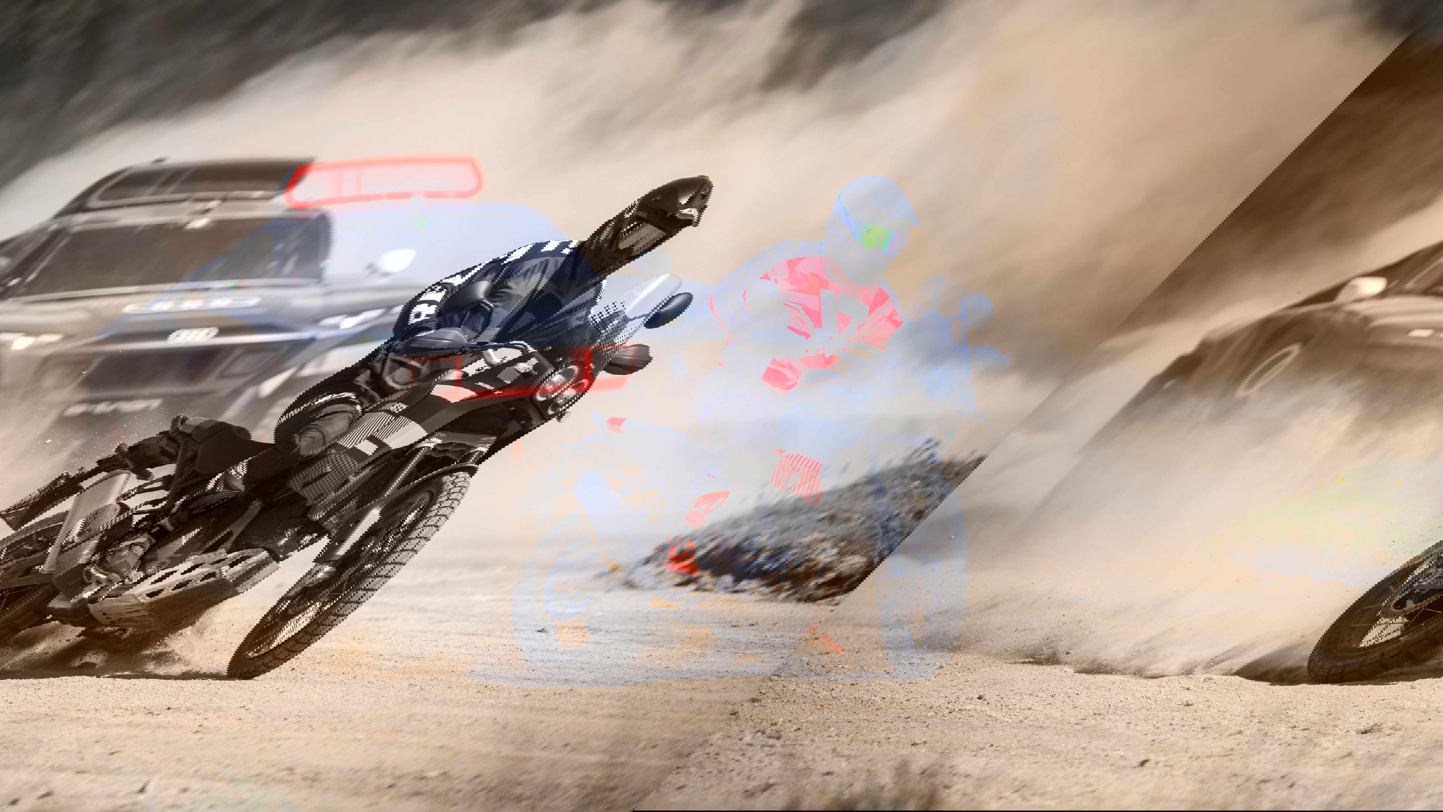 Danilo Petrucci on Ducati DesertX with Carlos Sainz in Audi RS Q e-tron, Sardegna promo. - Ducati Media